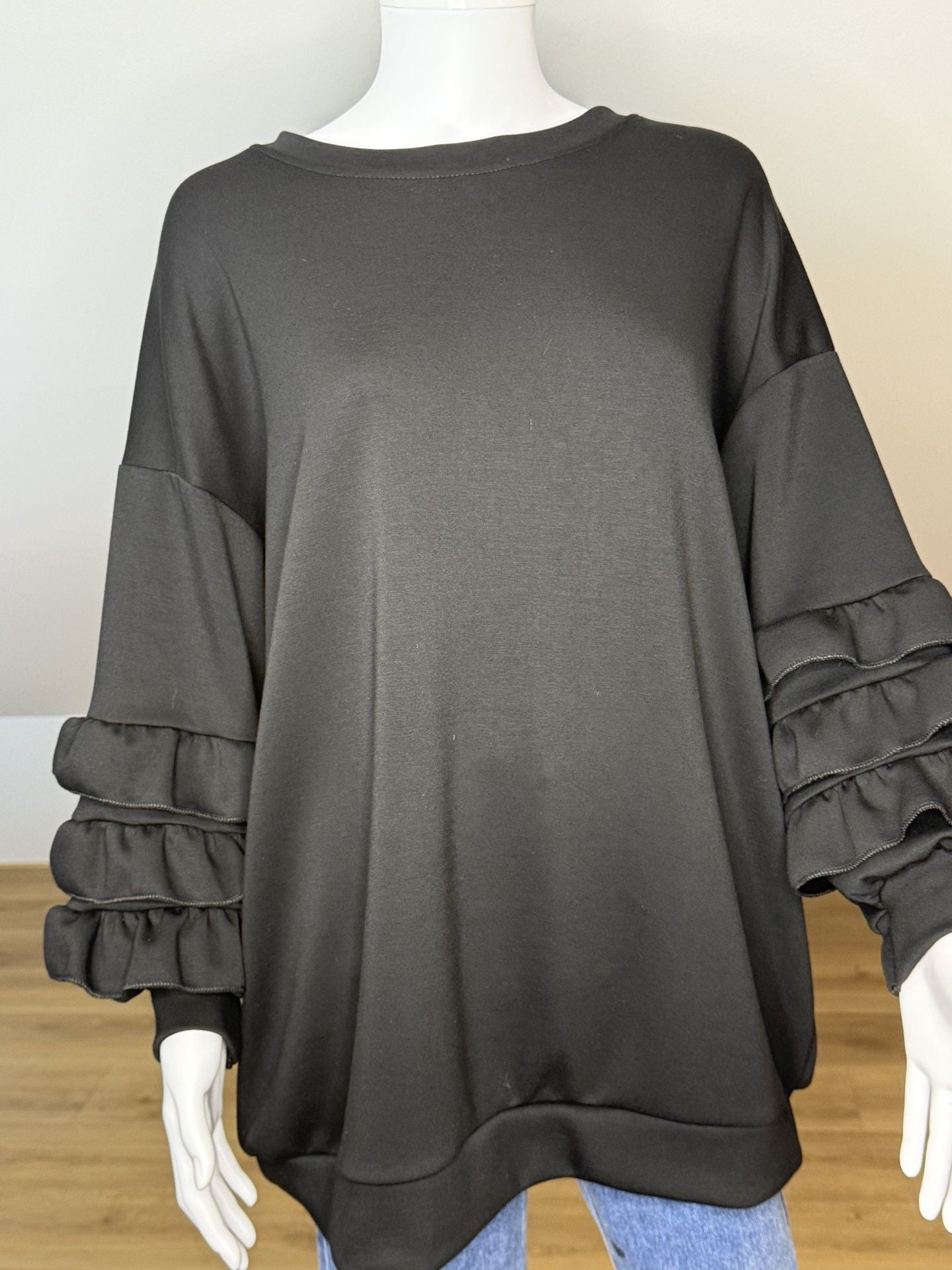 Sweater franje mouw